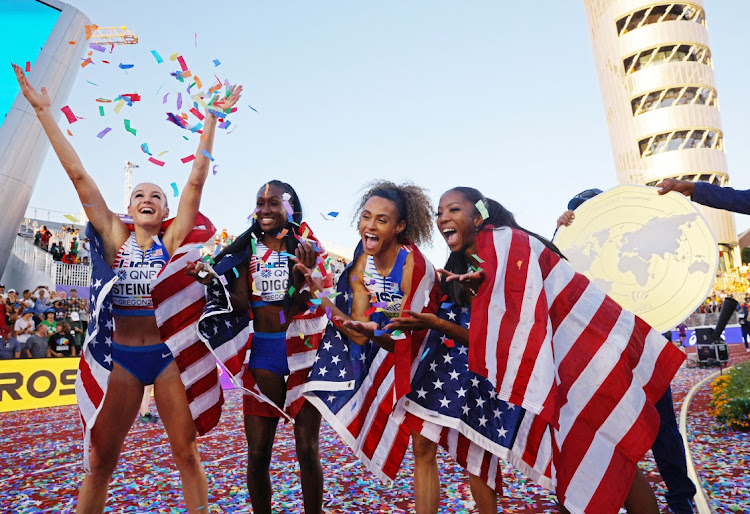 Talitha Diggs, Abby Steiner, Britton Wilson and Sydney McLaughlin of the US celebrate winning the women's 4x400m final.