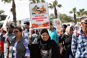 Over a thousand people marched to Parliament to protest against the killing of Rohingya Muslims in Myanmar. 