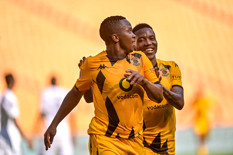 Nkosingiphile Ngcobo celebrates scoring Kaizer Chiefs' only goal with teammate Pule Mmodi in their DStv Premiership win against Richards Bay FC at FNB Stadium in Johannesburg on Saturday.