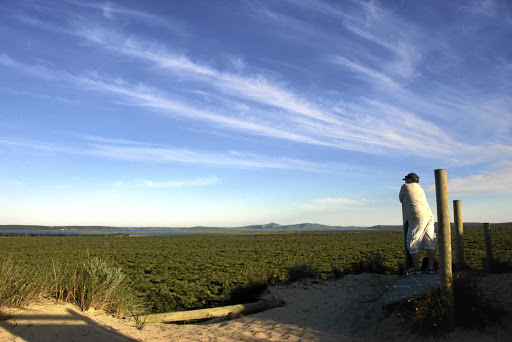 Hiker Grant Petersen admires the view on the day-trip-friendly 1km Dawid Bester Trail in the West Coast National Park.