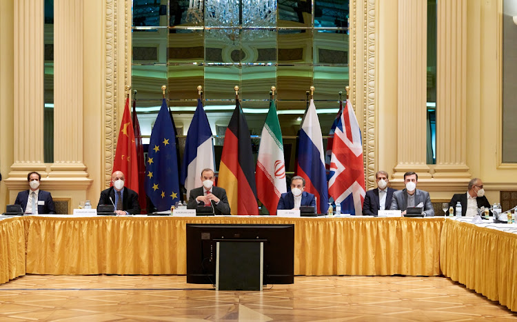 European External Action Service (EEAS) deputy secretary-general Enrique Mora and Iranian deputy at ministry of foreign affairs Abbas Araghchi wait for the start of a meeting of the JCPOA Joint Commission in Vienna, Austria, on April 6 2021.