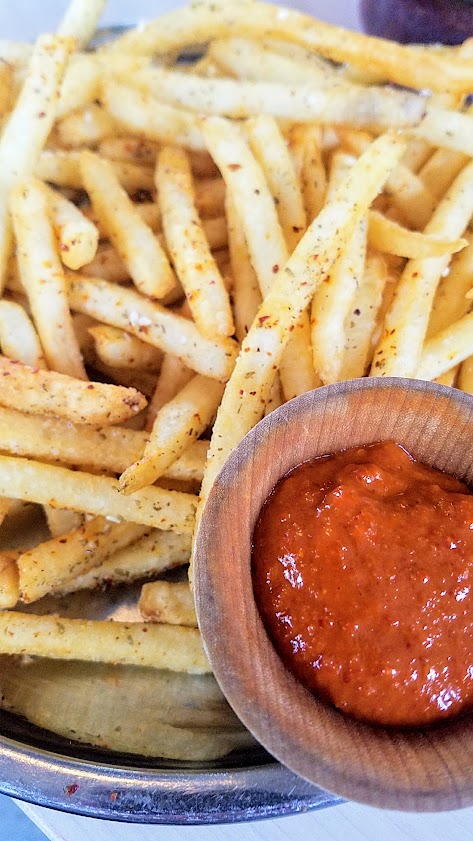 Tusk Weekend Happy Hour, served Saturday Sunday 2:30-5PM between brunch and dinner. Za'atar fries are hard to resist and are plenty to share for the table