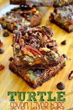 Turtle Seven Layer Bars was pinched from <a href="http://thedomesticrebel.com/2014/10/15/turtle-seven-layer-bars/" target="_blank">thedomesticrebel.com.</a>