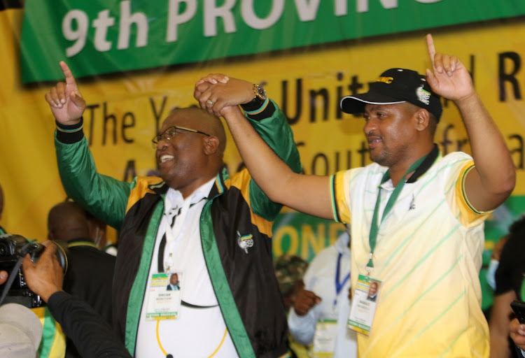 Two candidates who are up against each other for the top ANC seat in the Eastern Cape, Oscar Mabuyane and Babalo Madikizela seen dancing together and holding hands during the Conference held in East London ICC.