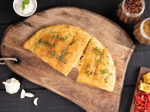 Red Paprika And Paneer Stuffed Garlic Bread