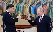 Russian President Vladimir Putin and Chinese President Xi Jinping attend a reception at the Kremlin in Moscow, Russia March 21, 2023. 