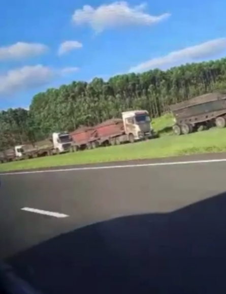 Coal trucks line up on the N2 for access to the Richard Bay port