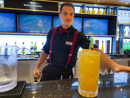 Daniil-with-QB-Cooler.jpg -  A Celebrity Cruises mixologist makes a QB Cooler for a guest.