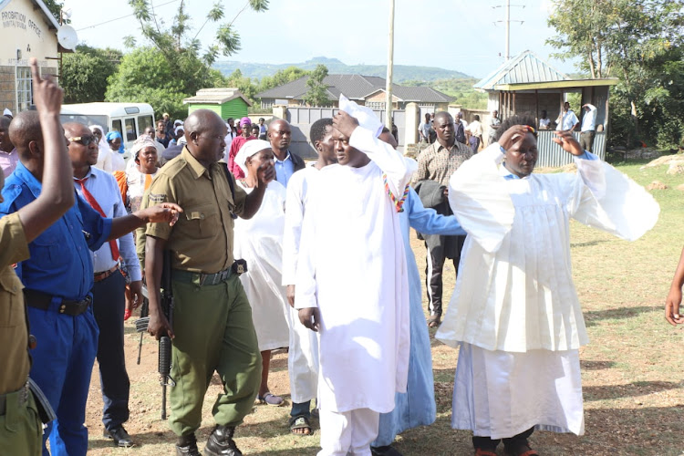 Police officers with clerics Achuodho Kachuodho and Joseph Chenge at Mbita court in Mbita town on May 18,2023