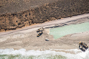 Mining for heavy minerals on the west coast beach north of the Olifants River.  