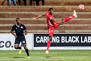 Mothobi Mvala of Highlands Park and Sifiso Mbhele of Free State Stars during the Absa Premiership match between Highlands Park and Free State Stars at Makhulong Stadium on April 17, 2019 in Johannesburg, South Africa. 