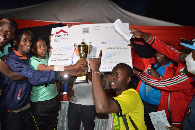 Superoot Kiamumbi team celebrate after emerging winners of Kiambu Township Football League.