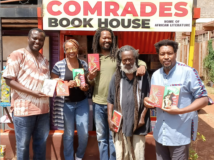 Njuki Githethwa with literati at the Comrades Book House, including Wakanyota (C) and Mukoma Ngugi (R)