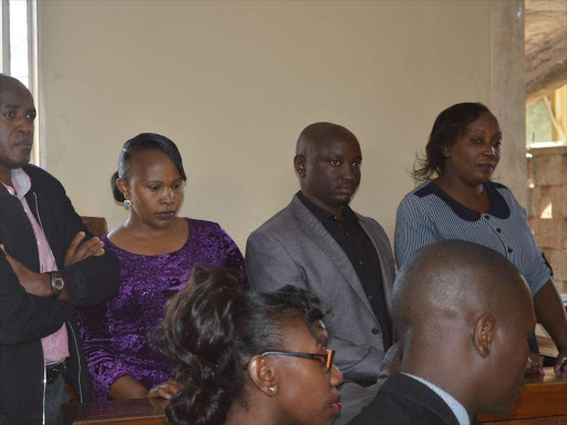 Gakuyo Real Estate and Ekeza Sacco employees in a Kiambu court yesterday / STANLEY NJENGA