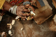 A generic image of a sangoma throwing bones.