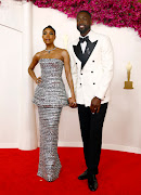 Gabrielle Union and Dwyane Wade pose on the red carpet during the Oscars arrivals at the 96th Academy Awards in Hollywood, Los Angeles. 