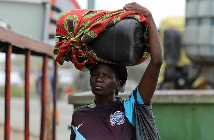 Hamila Simba carries petrol to Zimbabwe.