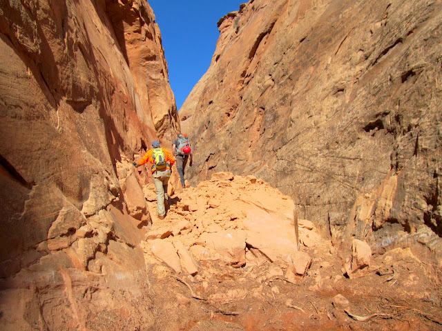 Climbing over the rockfall