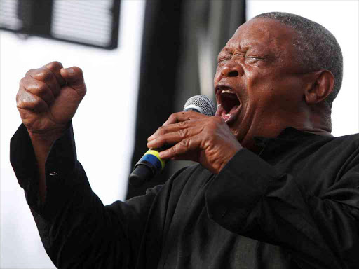 South African trumpeter and musician Hugh Masekela performs on the final day of the 21st Annual St Lucia Jazz festival at Pigeon Island National Landmark, May 13, 2012. /Reuters