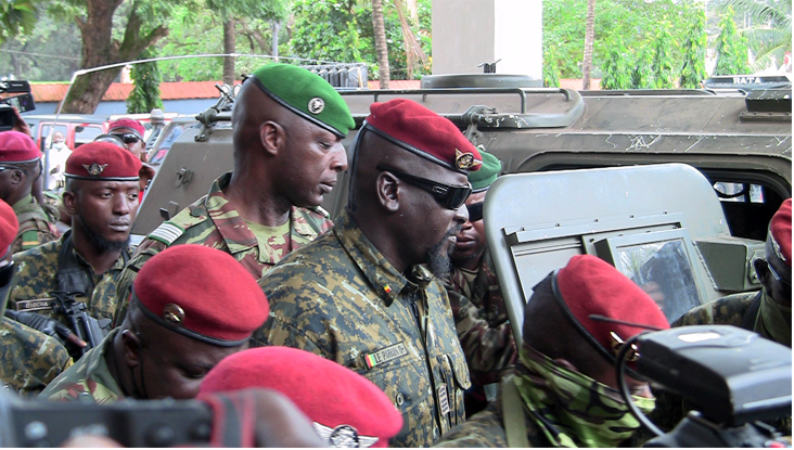 Special forces commander Mamady Doumbouya, who ousted President Alpha Conde, walks out after meeting envoys from the Economic Community of West African States (ECOWAS) for the Guinea crisis to discuss ways to steer the country back toward constitutional regime, in Conakry, Guinea on September 10, 2021