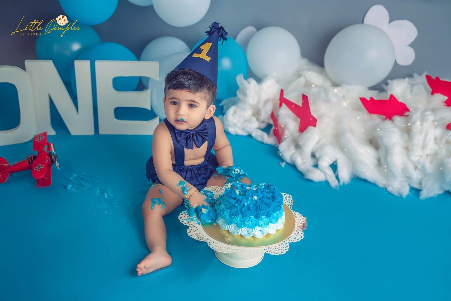 Trust Little Dimples By Tisha photographers to capture the joy of your little ones having fun. Contact us for the Best Cake smash photography Bangalore.