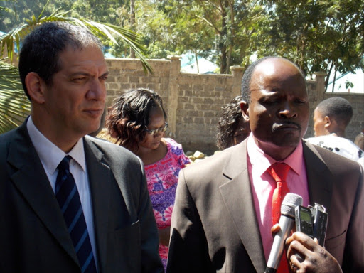 Ambassador Yohel Vilan and Migori Governor Okoth Obado in Migori town on Monday when the Israeli government made donations to the county's flood victims. Photo/MANUEL ODENY