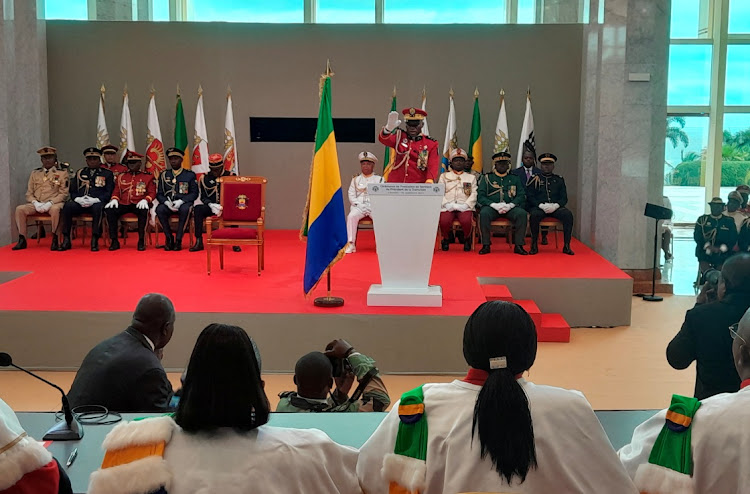 Gabon coup leader General Brice Oligui Nguema is sworn in as interim president during his swearing-in ceremony, in Libreville, Gabon, September 4, 2023. Picture: REUTERS/GERAUDS WILFRED OBANGOME