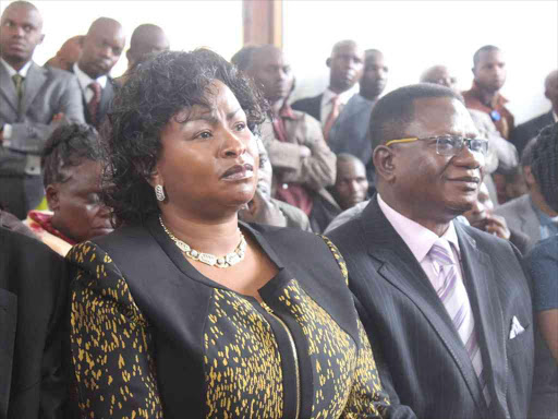 Petitioner Wavinya Ndeti and husband Henry Dola in court on September 17,2013.Photo/file