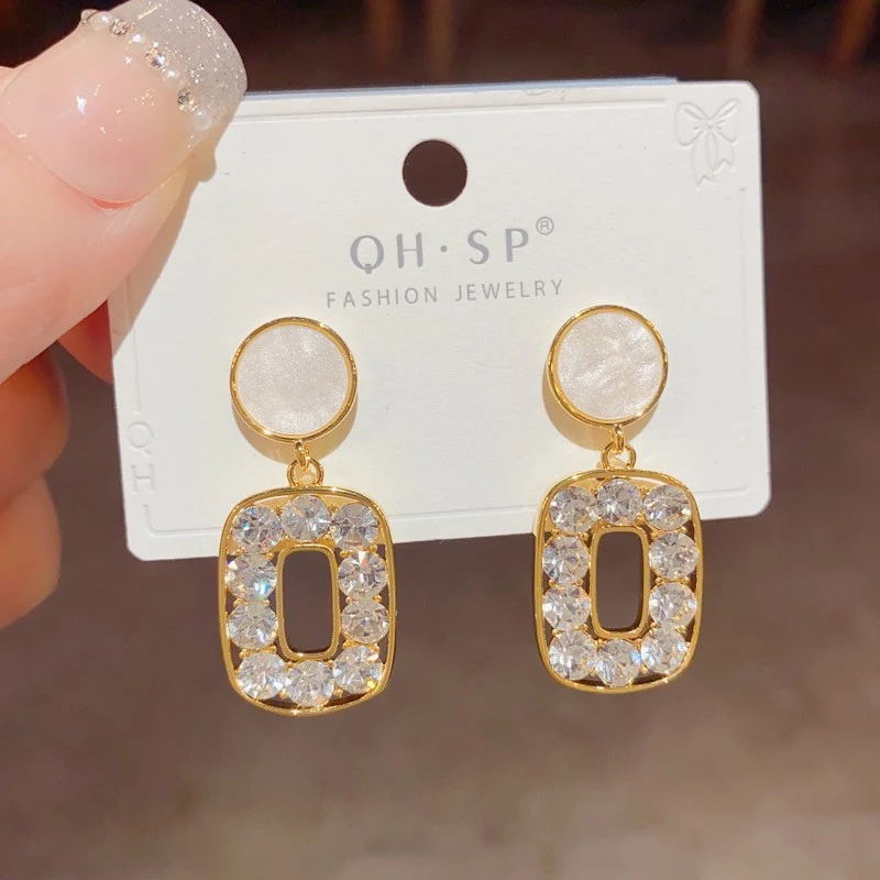 Boucles d'oreilles épingle en argent 925, longues pampilles géométriques classiques, un accessoire élégant pour toutes occasions.