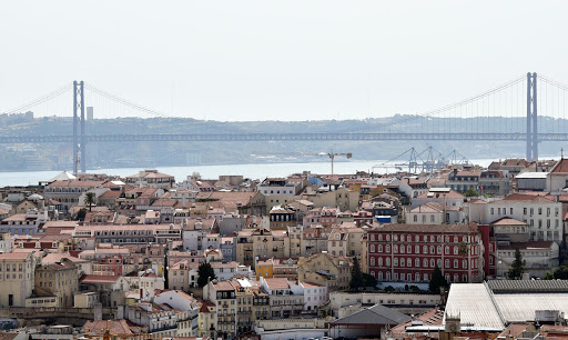 lisbon-cityscape-bridge-1.jpg - 25 de Abril Bridge, the largest suspension bridge in Europe, was designed by the same person who designed the Golden Gate Bridge.