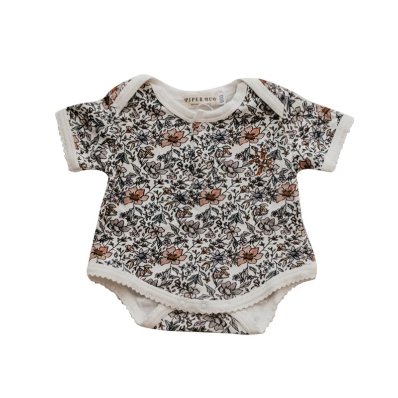 Body triangolare a maniche corte per neonati. Abbigliamento per neonati morbido e traspirante, perfetto per la pelle delicata del bambino.
