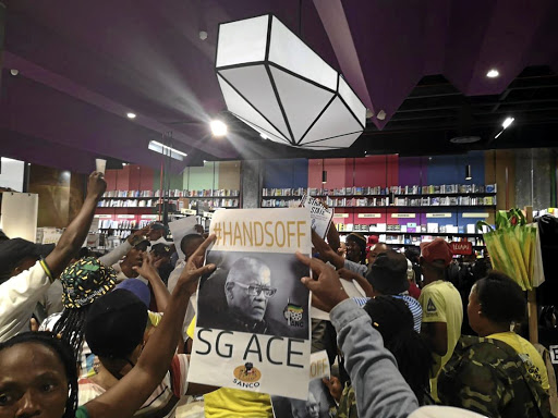 Protesters storm the book launch of 'Gangster State' at Exclusive Books in Sandton, in defence of ANC Secretary General Ace Magashule.