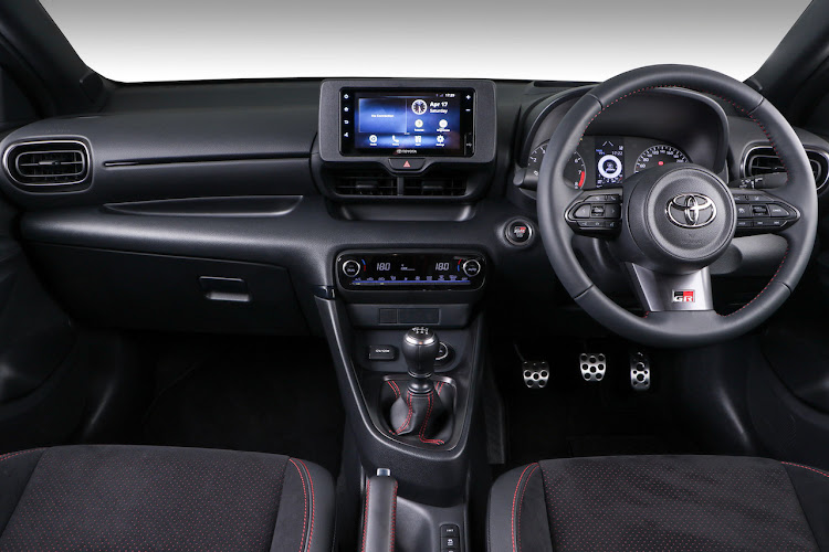 Interior is standard Yaris fare, save for the bucket seats and aluminium pedals.