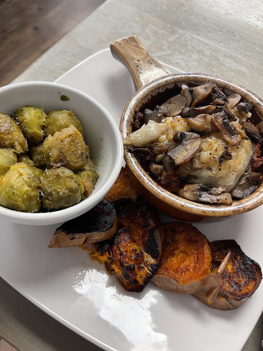 Meatloaf (hiding underneath the added grilled onuons and mushrooms-which i do not recommend the adder for $2. Not flavorful and the mushrooms were rubbery). Brussel sprouts. Coconut sweet potatoes-cooked in coconut oil.