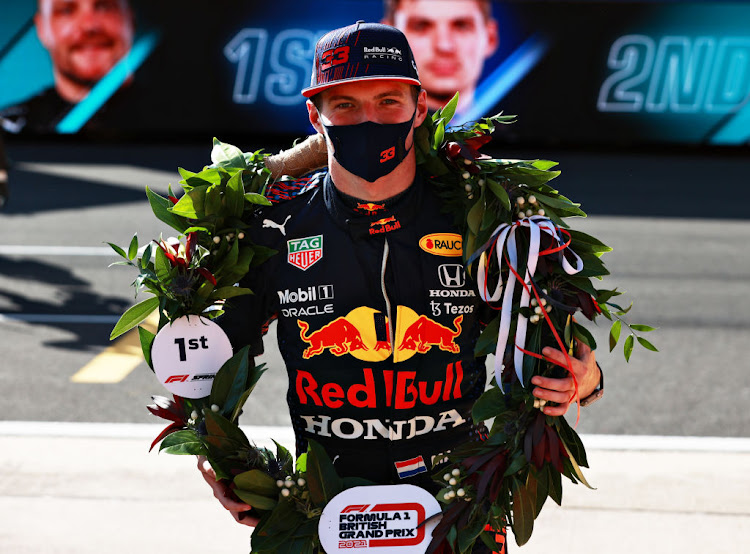 Winner Max Verstappen celebrates in parc ferme during the Sprint for the F1 Grand Prix of Great Britain at Silverstone on July 17, 2021 in Northampton, England.