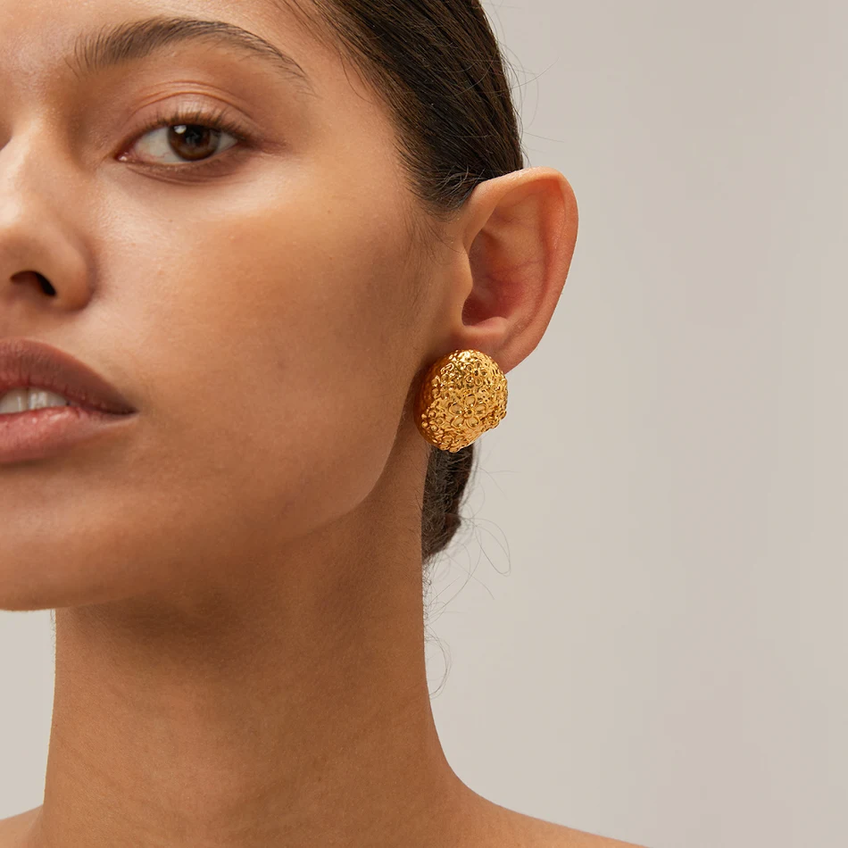 Gold Stainless Steel Hammer Patterned Flower Earrings. Add a touch of elegance to your look with these stylish and durab