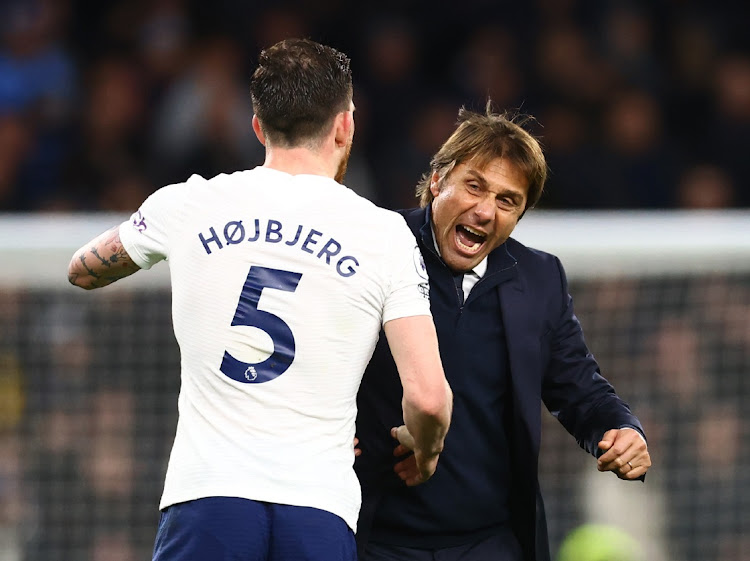 Tottenham Hotspur manager Antonio Conte and Pierre-Emile Hojbjerg celebrate after the win over Leeds United at Tottenham Hotspur Stadium, London on November 21, 2021