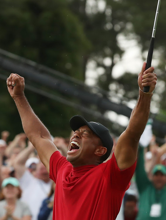 Tiger Woods of the U.S. celebrates on the 18th hole to win the 2019 Masters.