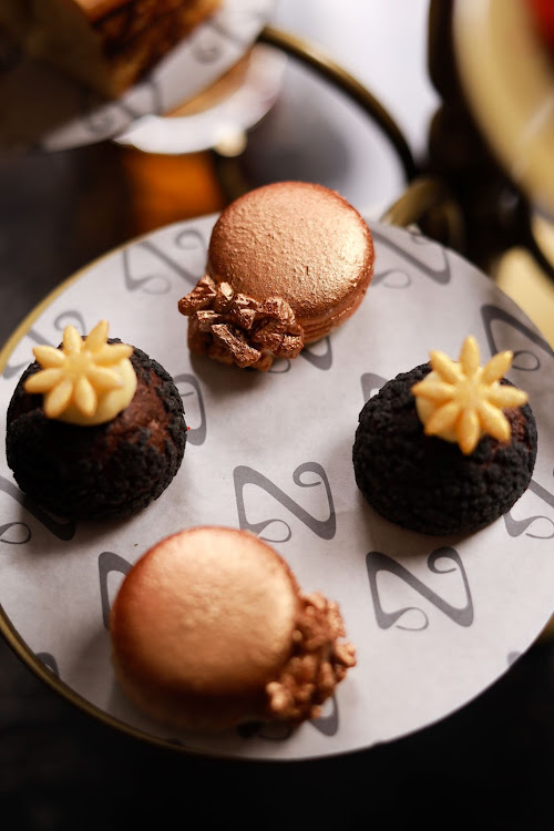 Pecan nut macaron, tres leche and sandypecan nuts & Choux puff, coffee and tonka bean cremeux.