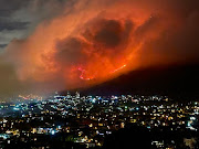 Strong overnight winds fanned the blazes in Cape Town. 