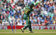 Faf du Plessis of South Africa is bowled during the ICC Champions Trophy match between India and South Africa at the Kia Oval cricket ground on June 11, 2017 in London, England. (Photo by Philip Brown/Getty Images)