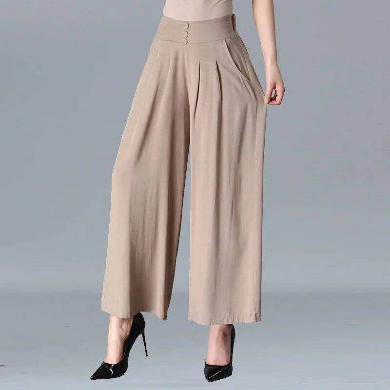 Pantalones anchos de mujer con cintura elástica y pierna amplia para comodidad y estilo. Ideales para un look casual y elegante, fáciles de combinar.
