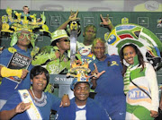 KE YONA
      : Soccer fans pose with the 
      
       trophy during the Nedbank Cup last-eight draw at The Venue in Melrose Arch, in Johannesburg, yesterday.
      Photo: Gallo Images