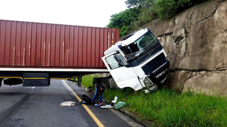 Two Durban police detectives died when a truck hit their vehicle on Edwin Swales Drive on Tuesday.