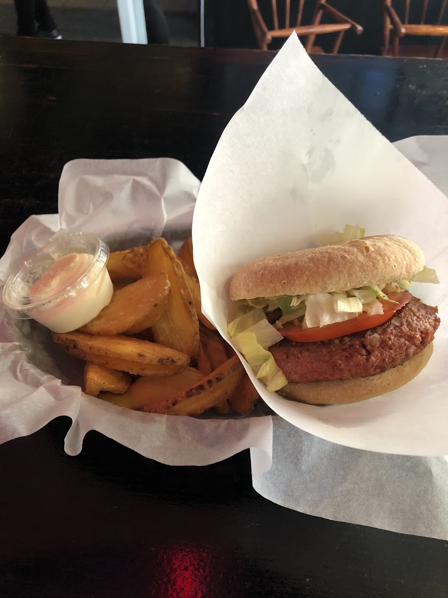 Beyond meat vegan burger with fries and garlic aioli