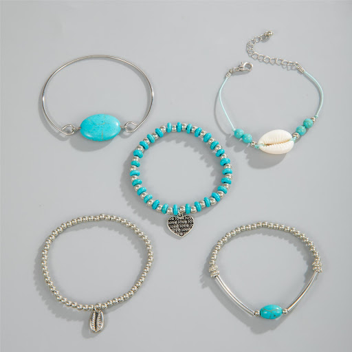 Title 20, Turquoise Leaf Bracelet Bow, an elegant accesso...