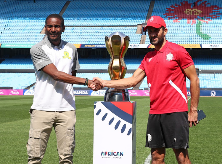 Mamelodi Sundowns Rulani Mokwena shakes hands with Wydad Casablanca counterpart Adil Ramzi ahead of African Football League (AFL) second leg final.