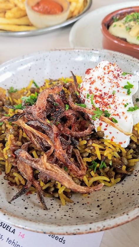 Tusk Weekend Happy Hour, served Saturday Sunday 2:30-5PM between brunch and dinner. A great way to slip in between the brunch and dinner rush - this is the Mujadara with rice, lentils, crispy onions, labneh, sumac