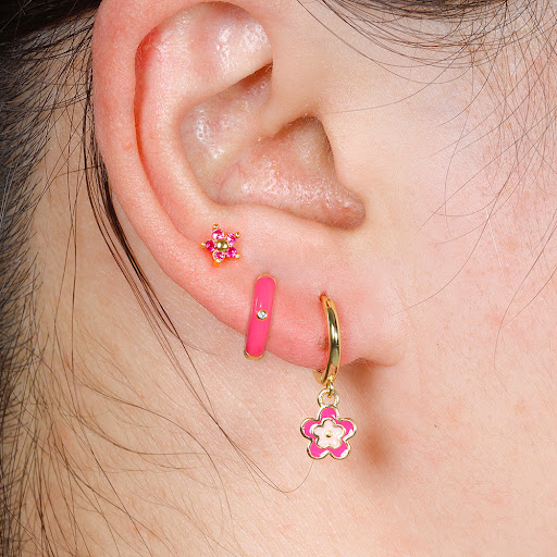 Title 9, Niche Design ear clip earrings, featuring an oi...