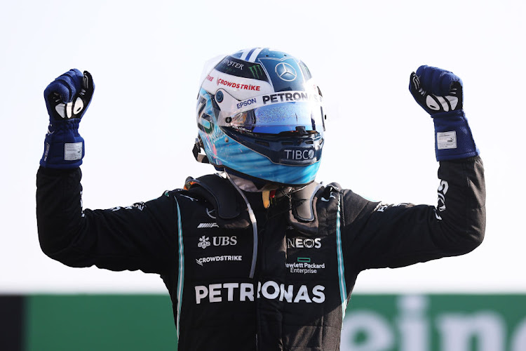 Winner Valtteri Bottas of Finland and Mercedes GP celebrates in parc ferme during the Sprint ahead of the F1 Grand Prix of Italy at Autodromo di Monza on September 11, 2021 in Monza, Italy.